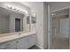 Bathroom vanity features a large mirror, lighting and white countertops at 128 Schultz St, Chapel Hill, NC 27514