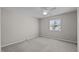 Standard bedroom with carpet floors, ceiling fan, window and natural light at 128 Schultz St, Chapel Hill, NC 27514