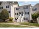 Charming two-story home with a well-maintained lawn and sidewalk at 128 Schultz St, Chapel Hill, NC 27514