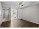 Open-concept living room with hardwood floors flowing into the dining area and kitchen at 128 Schultz St, Chapel Hill, NC 27514