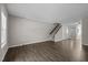 Spacious living room featuring new hardwood floors and staircase to the second floor at 128 Schultz St, Chapel Hill, NC 27514