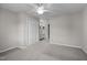 Main bedroom featuring a standard closet, carpet floors, and adjoined to bathroom at 128 Schultz St, Chapel Hill, NC 27514