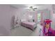 Charming bedroom featuring a cozy bed, soft carpet, and ample natural light at 1408 Bridgeport Dr, Raleigh, NC 27615