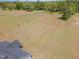 Aerial view showcasing the large lot size at 194 Spring Hill Church Rd, Lillington, NC 27546