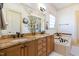 Bathroom showcases double vanity sinks, soaking tub, and granite counter tops at 20 Al Aqua Dr, Durham, NC 27707