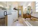 Bathroom features a tub, shower, and TV to enjoy while relaxing at 20 Al Aqua Dr, Durham, NC 27707