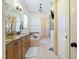 Bathroom showcases double vanity sinks, soaking tub, and elegant finishes at 20 Al Aqua Dr, Durham, NC 27707