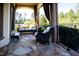 Relaxing outdoor covered patio area with nice view of the neighborhood pond at 20 Al Aqua Dr, Durham, NC 27707