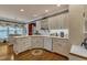 Bright kitchen featuring white cabinets, wood countertops, and hardwood floors at 208 E Harrington Ave, Broadway, NC 27505