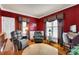 Cozy living room with hardwood floors, comfortable armchairs, and natural light at 208 E Harrington Ave, Broadway, NC 27505