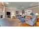 Spacious living room with comfortable seating, TV, and an archway leading to other rooms at 208 E Harrington Ave, Broadway, NC 27505