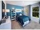 Inviting bedroom with creative wall decor and bright accents at 2233 Cherry Creek Rd, Haw River, NC 27258