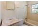 Bathroom featuring a bath tub with shower and a vanity with mirror at 2343 Derby Dr, Raleigh, NC 27610