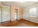 Bedroom featuring hardwood floors, closet and natural light at 2343 Derby Dr, Raleigh, NC 27610