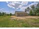 Spacious, sunny backyard featuring a partially cleared lot, ready for landscaping and personalization at 2820 Tara Dr, Clayton, NC 27520