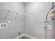 Image of a utility area with shelving, grey walls, and wood-look vinyl flooring at 2820 Tara Dr, Clayton, NC 27520