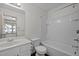 Bathroom featuring white vanity and tub/shower combination at 300 Nc 54 # E3, Carrboro, NC 27510