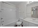 Bathroom featuring white subway tile surround and tub/shower combination at 300 Nc 54 # E3, Carrboro, NC 27510