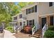 Exterior of a townhome with red brick and light colored vinyl siding at 300 Nc 54 # E3, Carrboro, NC 27510