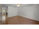 Spacious living room featuring neutral walls, hardwood floors, ceiling fan and natural light at 300 Nc 54 # E3, Carrboro, NC 27510