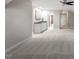 Spacious bonus room features neutral carpet, wet bar, and access to other rooms at 30038 Village Park Dr, Chapel Hill, NC 27517