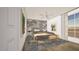 Bright and stylish main bedroom featuring a ceiling fan, neutral decor, artwork, and natural light at 307 Burke St, Dunn, NC 28334