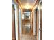 Hallway leading to living spaces, showcasing the layout of the home at 311 N Nash St, Hillsborough, NC 27278