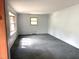 Spacious living room with large windows, offering plenty of natural light at 311 N Nash St, Hillsborough, NC 27278