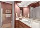 Well-lit bathroom featuring a vanity with a stylish faucet and an elegant design throughout the space at 3203 Cameron Dr, Henderson, NC 27536