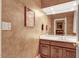 Powder room with a single sink, ample counter space and neutral paint at 3203 Cameron Dr, Henderson, NC 27536