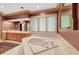 Bathroom with a large soaking tub, and tiled walls at 3203 Cameron Dr, Henderson, NC 27536