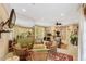 Spacious bonus room with workout equipment, natural light, and comfortable seating area at 3203 Cameron Dr, Henderson, NC 27536