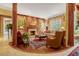 Cozy living room with fireplace, hardwood floors, and elegant decor at 3203 Cameron Dr, Henderson, NC 27536
