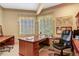 Comfortable home office space with natural light at 3203 Cameron Dr, Henderson, NC 27536