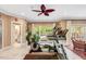 Bright workout room with an elliptical, and scenic views overlooking the pool area at 3203 Cameron Dr, Henderson, NC 27536