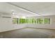 Open living area with big picture windows and views to trees at 3605 Moonlight Dr, Chapel Hill, NC 27516