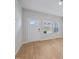 Bright, modern living room featuring beautiful hardwood floors and natural light at 3705 Rosebush Dr, Zebulon, NC 27597