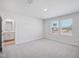 Bedroom with neutral carpet, natural light, and adjoining bathroom at 3707 Rosebush Dr, Zebulon, NC 27597