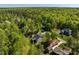 Expansive aerial view of homes surrounded by lush forest in a serene neighborhood at 3805 Watermark Dr, Franklinton, NC 27525