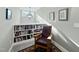 Cozy reading nook with built-in bookshelves and comfortable rocking chair at 3805 Watermark Dr, Franklinton, NC 27525