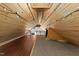 View of finished attic space featuring vaulted wood plank ceiling with accent lights and mix of carpet and wood flooring at 3832 Crimson Clover Ave, Wake Forest, NC 27587