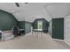 Spacious carpeted bonus room has natural light and ample room for hobbies at 3832 Crimson Clover Ave, Wake Forest, NC 27587