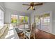 Inviting breakfast nook with banquette seating, ample natural light, and sliding glass doors to outdoor area at 3832 Crimson Clover Ave, Wake Forest, NC 27587