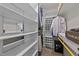 Walk-in closet with ample storage shelves and hanging rods for clothing and accessories at 3832 Crimson Clover Ave, Wake Forest, NC 27587