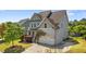 Charming two-story home with a well-manicured lawn, blossoming shrubs, and an attached two-car garage at 3832 Crimson Clover Ave, Wake Forest, NC 27587