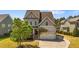 Charming two-story home with a two-car garage and mature landscaping at 3832 Crimson Clover Ave, Wake Forest, NC 27587