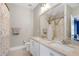 Bathroom featuring double sinks, granite countertops and framed vanity mirrors at 4001 Belmont Forest Way, Raleigh, NC 27606