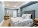 Charming bedroom with an en-suite bathroom featuring cool paint colors at 4001 Belmont Forest Way, Raleigh, NC 27606