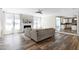 Inviting living room featuring a fireplace, hardwood floors, and plenty of natural light at 4001 Belmont Forest Way, Raleigh, NC 27606