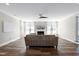 Spacious living room with fireplace, neutral tones, and hardwood floors at 4001 Belmont Forest Way, Raleigh, NC 27606